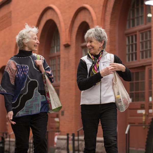Two female seniors walking