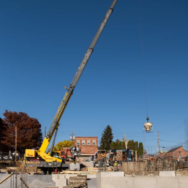 A crane moving a heavy object.