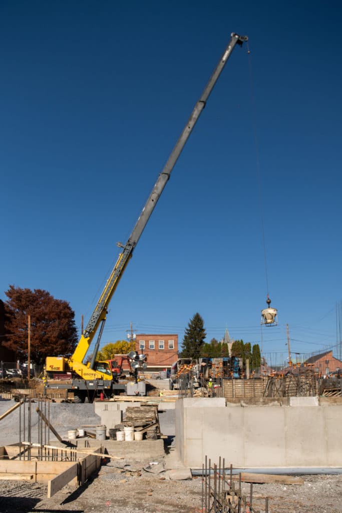 A crane moving a heavy object.