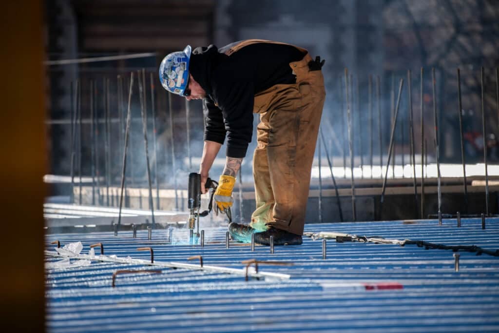 construction worker drilling