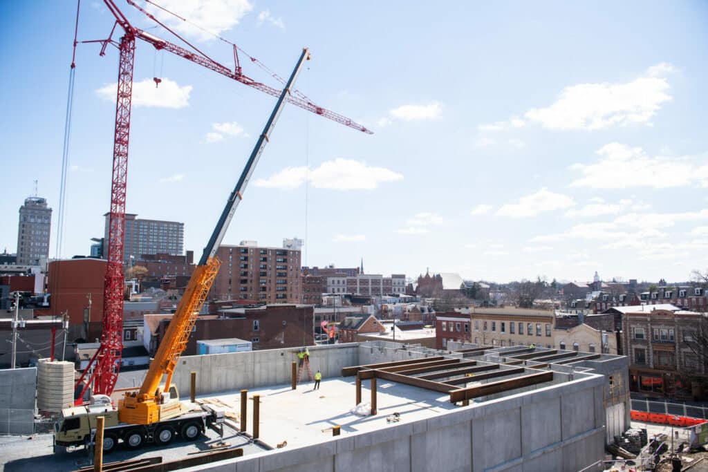 crane on top of building during construction