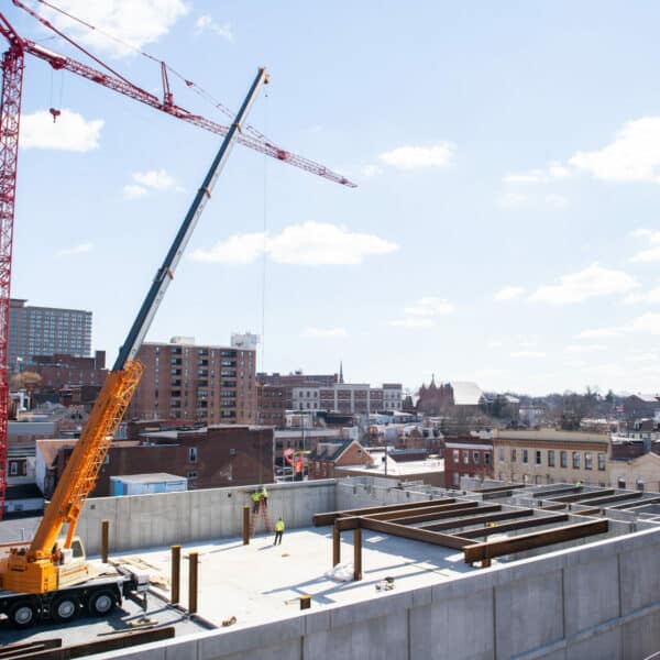 crane on top of building during construction