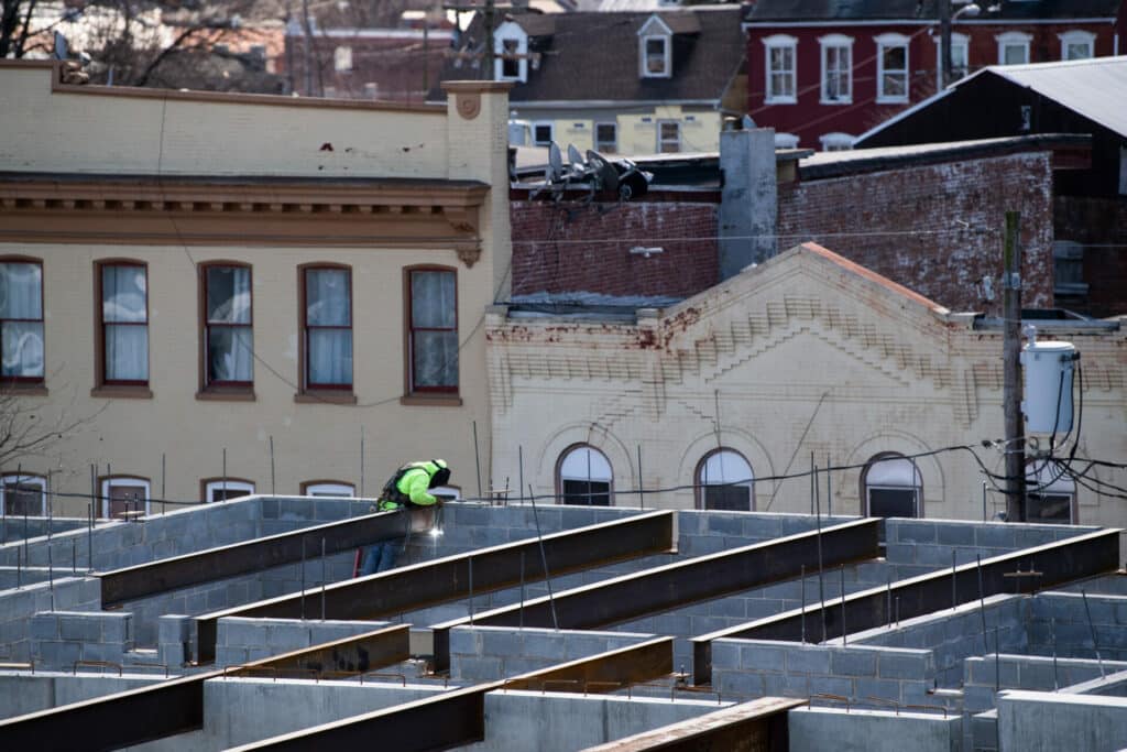 construction worker setting up steel