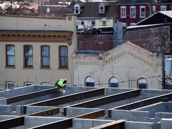 construction worker setting up steel