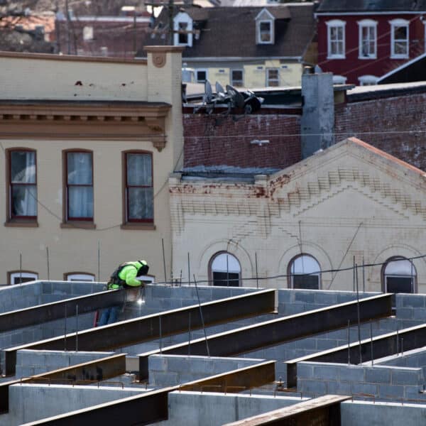 construction worker setting up steel