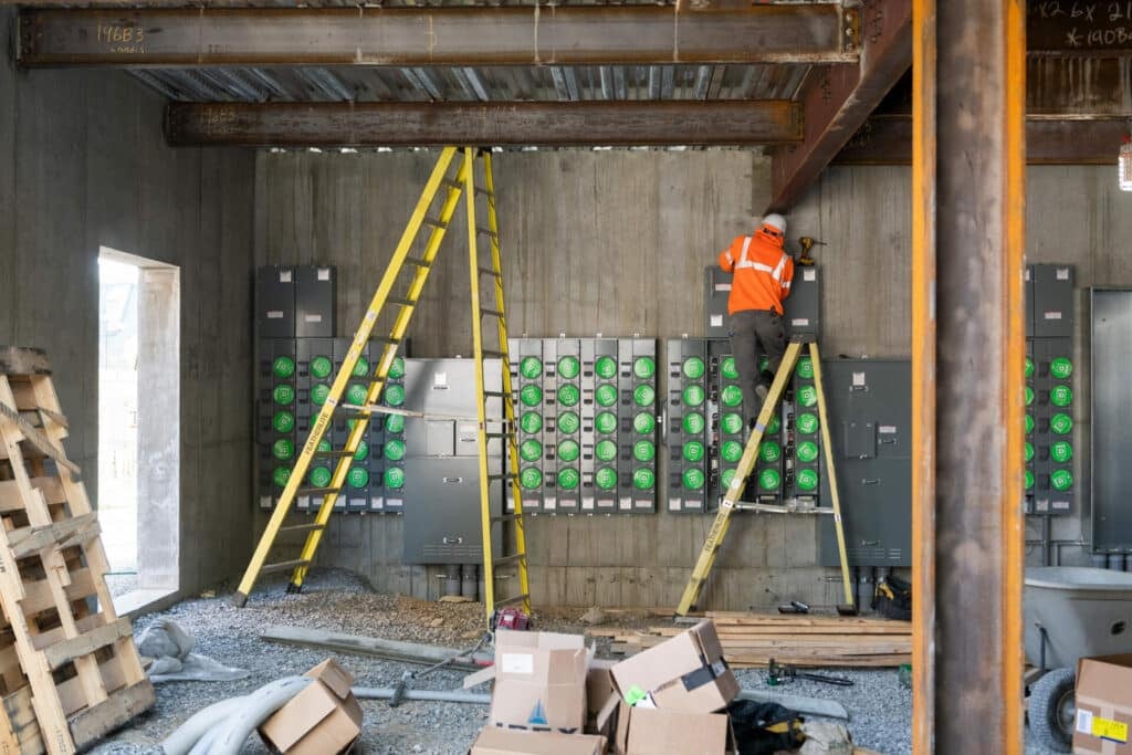 construction worker on ladder