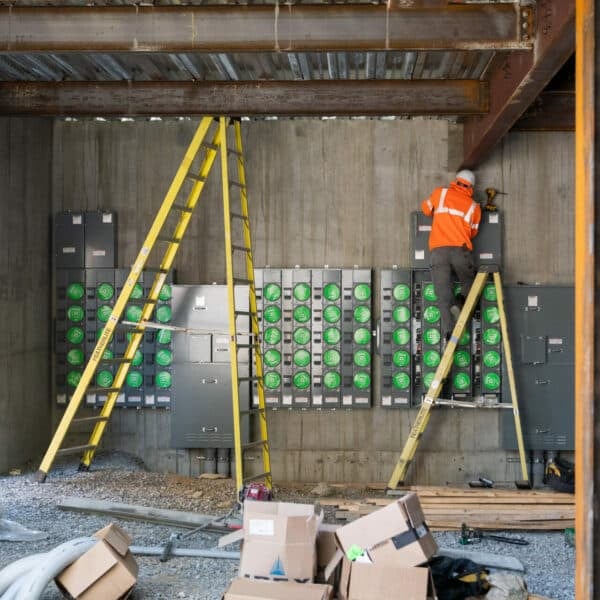 construction worker on ladder