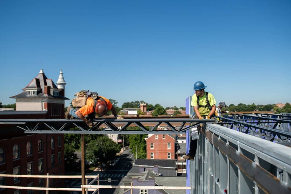 construction worker on beam