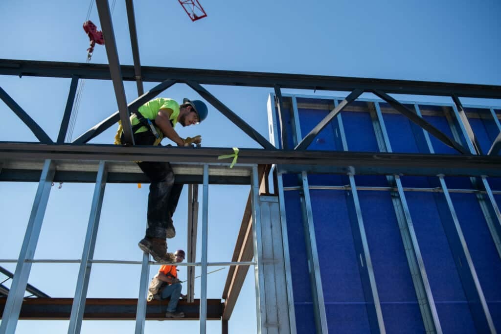 construction worker on beam